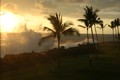 Sunset, a king tide and southerly swell near our condo in Kona.