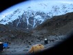 Salkantay and icy tents at dawn through a frozen camera lens.